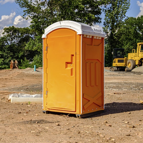 what is the cost difference between standard and deluxe portable restroom rentals in Jones